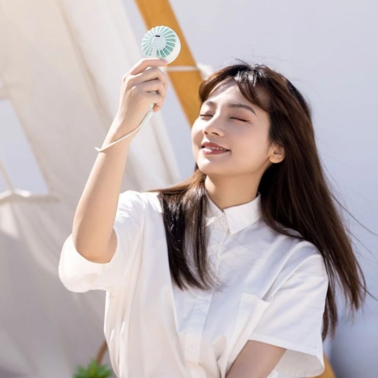 Mini Portable Handeled Fan With Rechargeable Battery